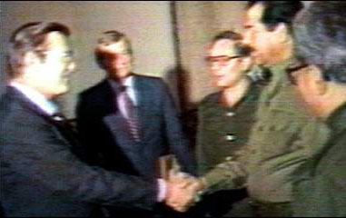 rumsfeld shaking hands with saddam