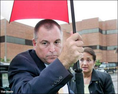 Tom Noe and His Wife At The Courtroom 