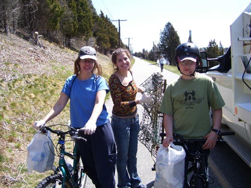 picking up trash on bikes